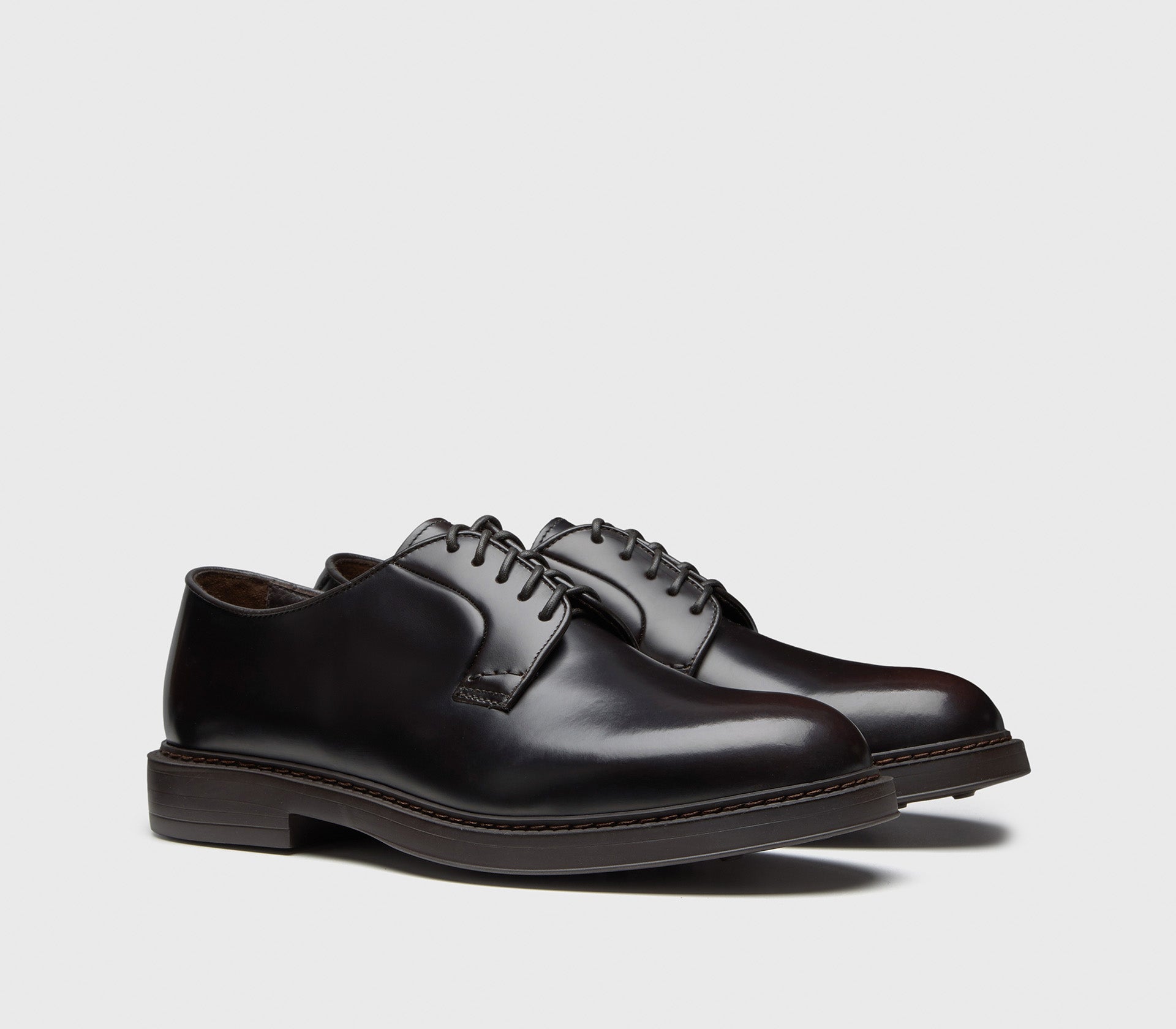 DU1385BRUXUF007TM04 - Stringata in pelle marrone
