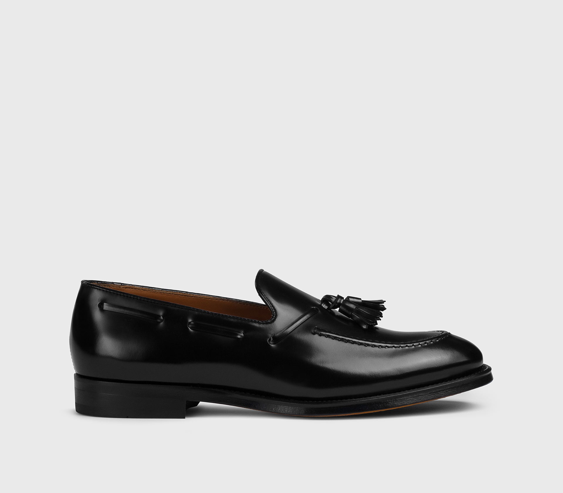 DU3339ORVNUF007NN00 - Mocassino con nappine in pelle nero
