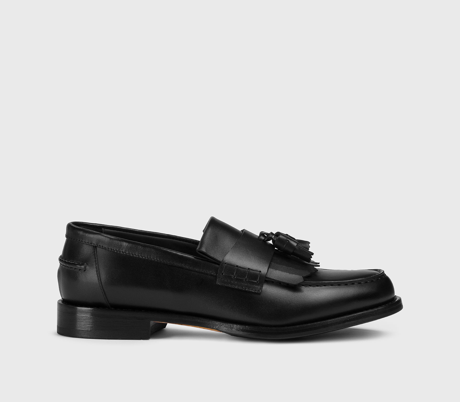 DU3498BRANUF159NN00 - Mocassino con nappine e frangia in pelle nero