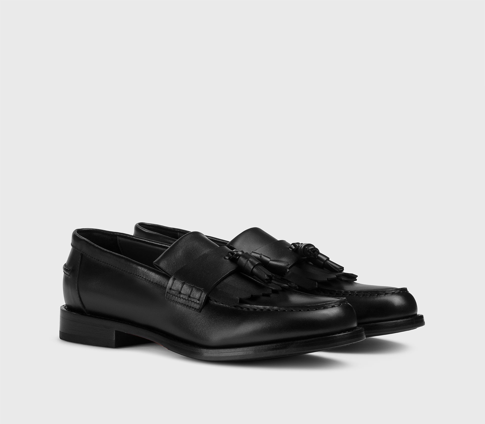 DU3498BRANUF159NN00 - Mocassino con nappine e frangia in pelle nero