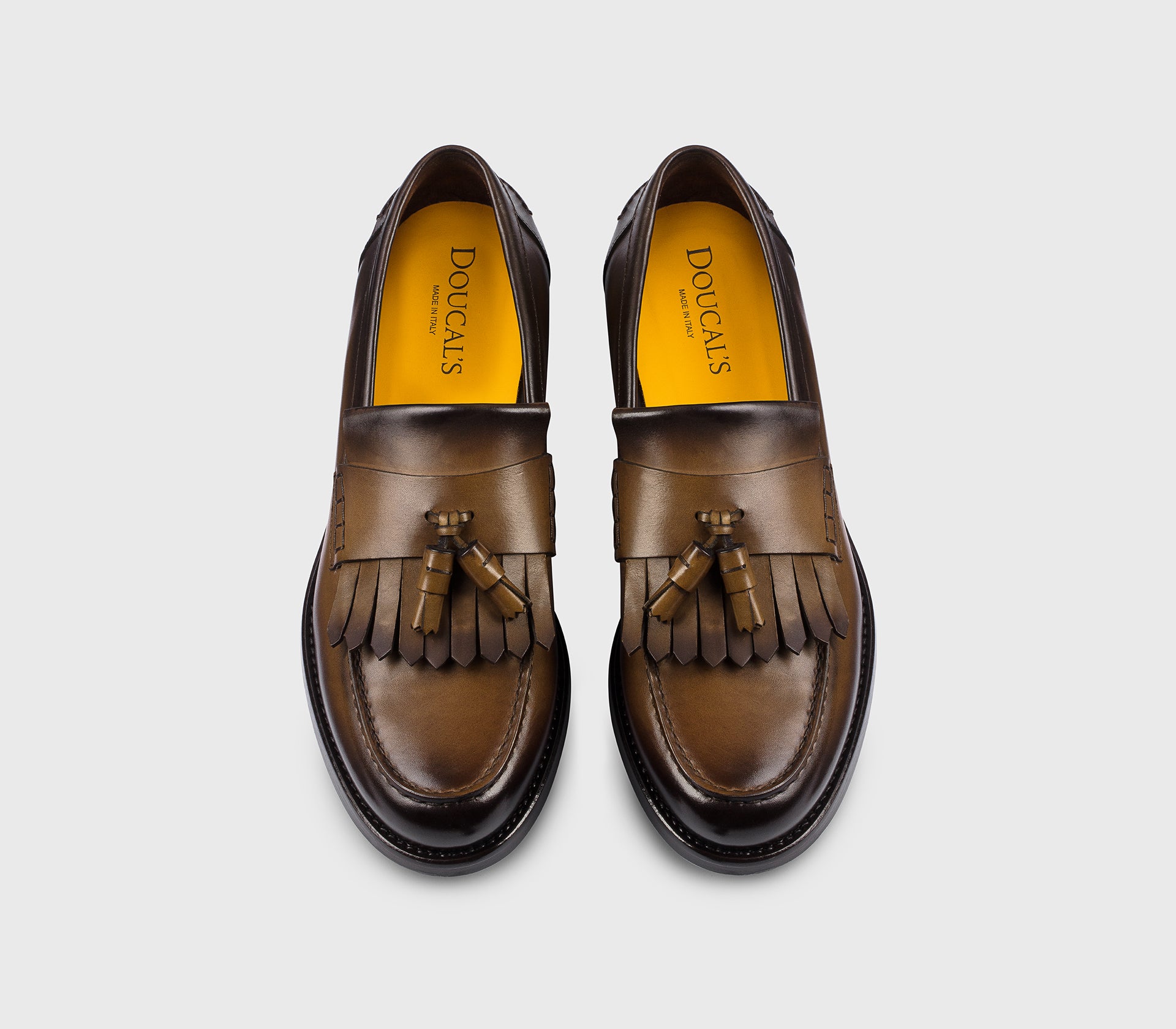 DU3498BRANUF159TM45 - Mocassino con nappine e frangia in pelle marrone "wood"
