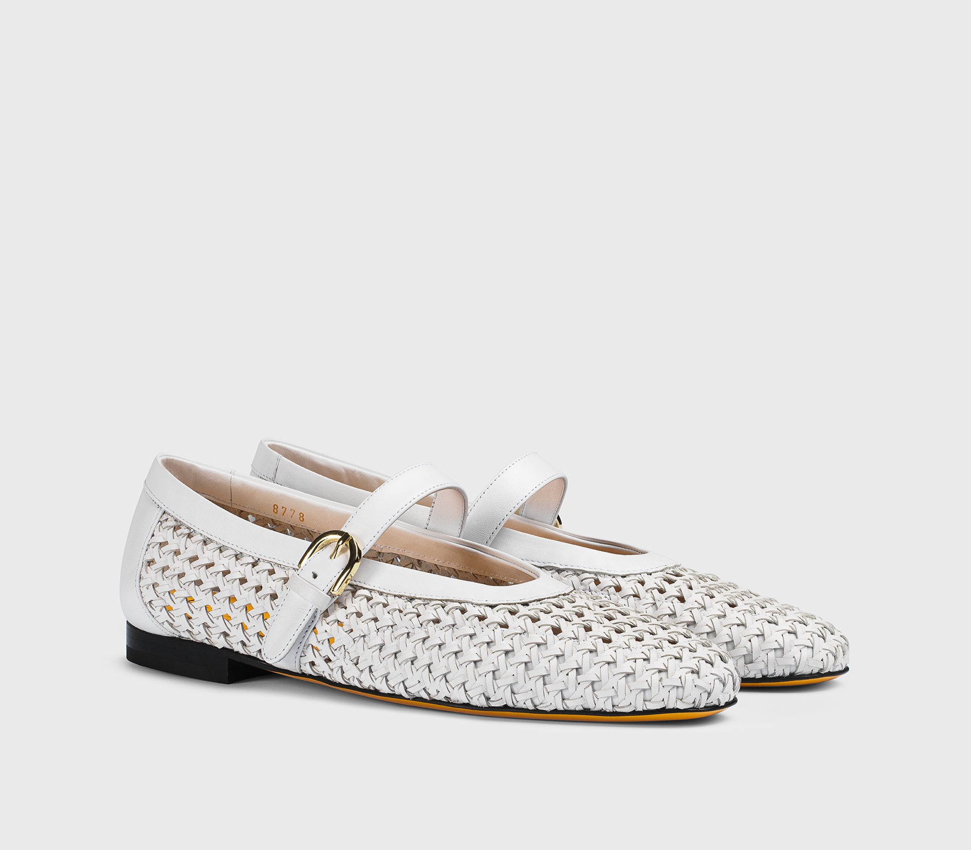 White leather ballet flat with strap