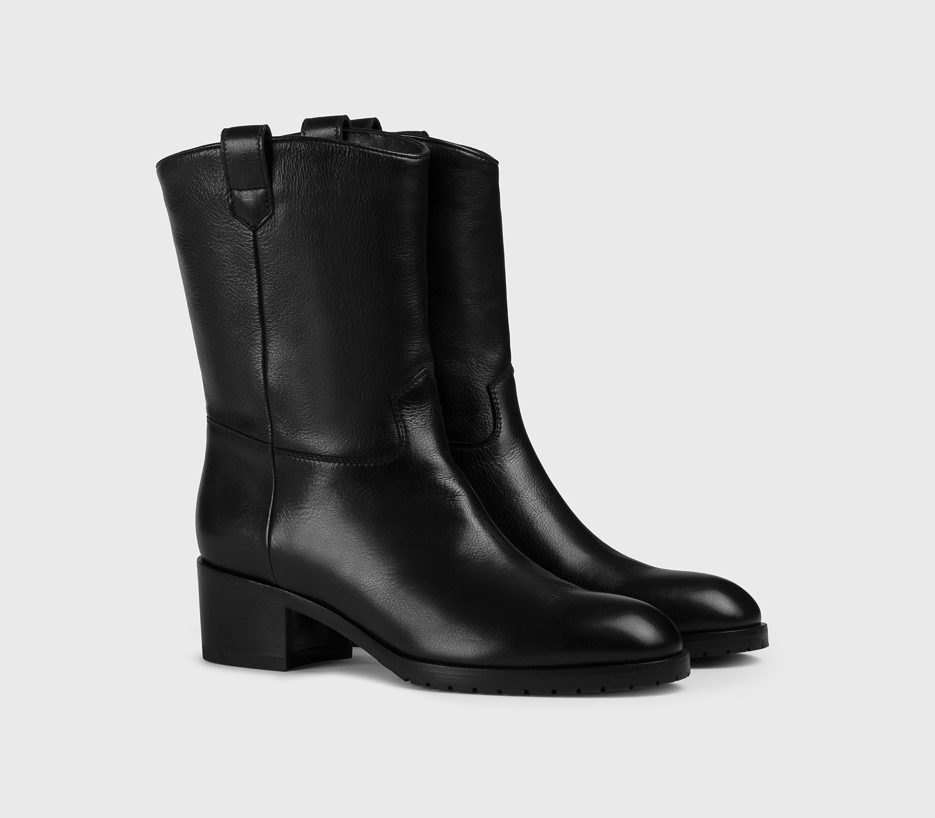 Bottine zippée en cuir noir
