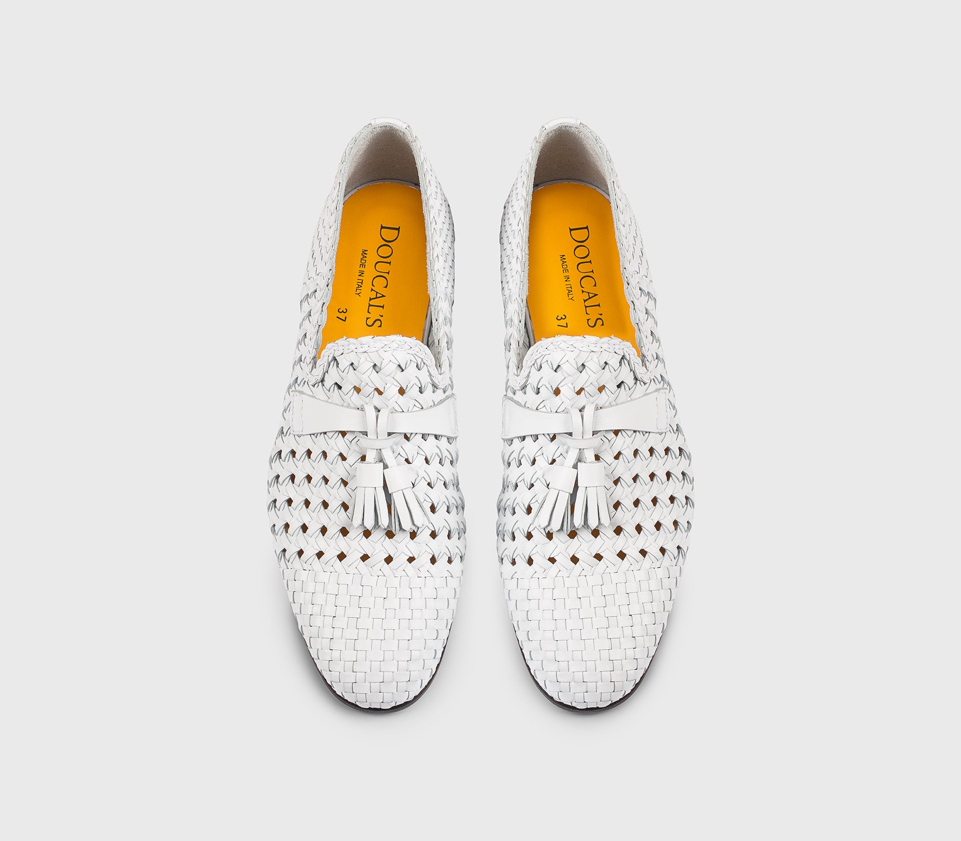 DD8875MEGNUZ280NW00 - Mocassino con nappine in pelle traforata bianco