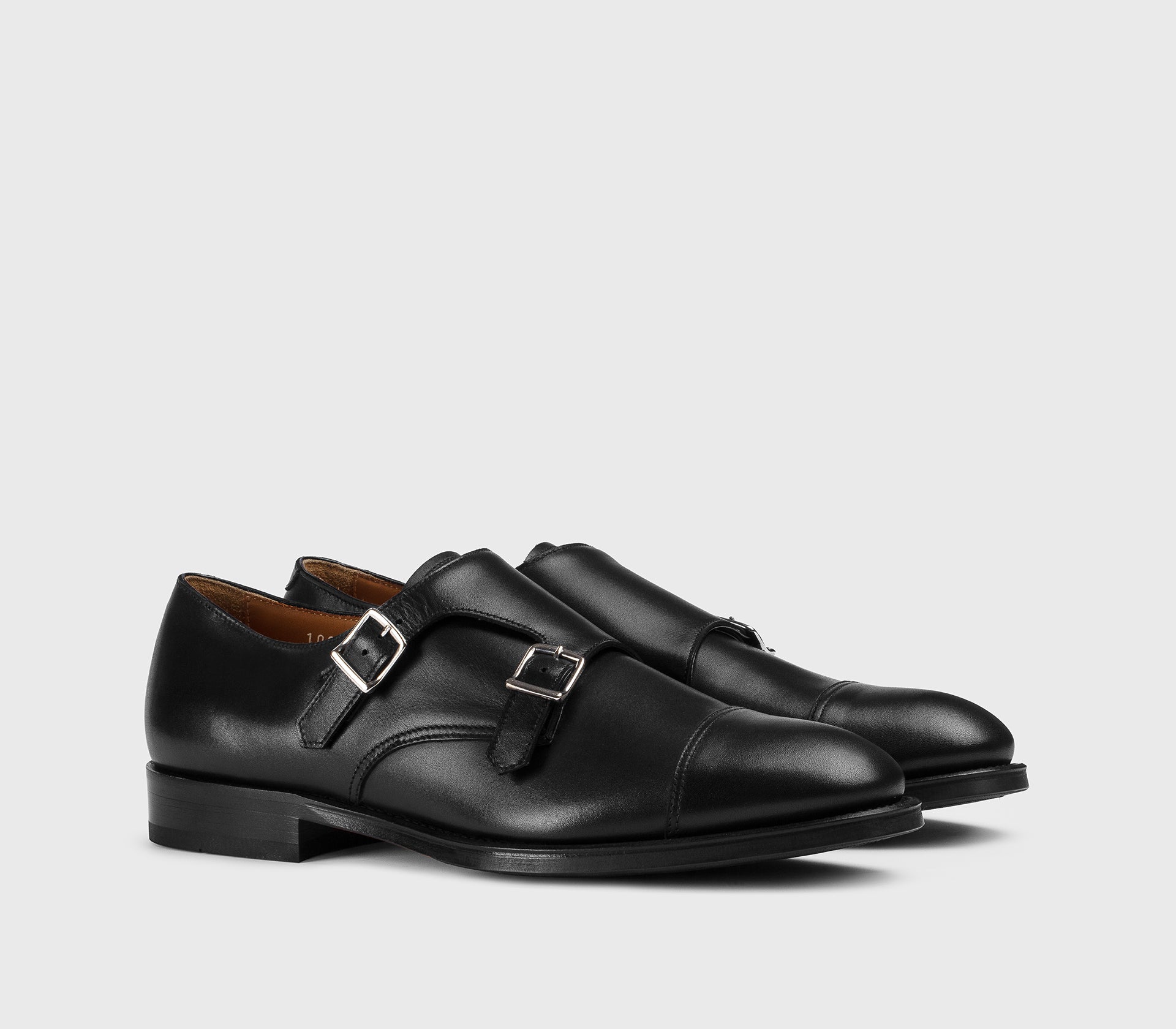 Chaussure à double boucle en cuir noir