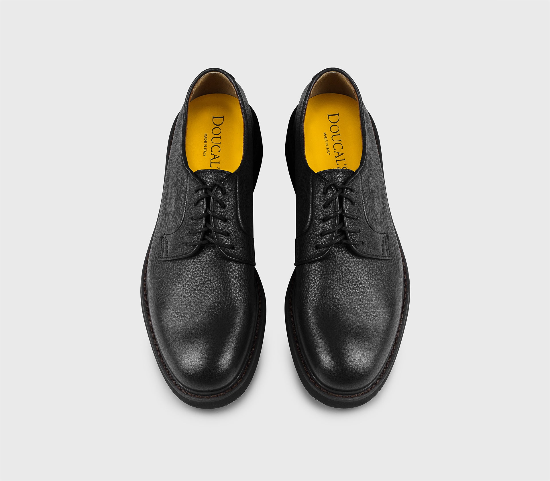 DU1385ROBEUZ225NN00 - Stringata in pelle bottalata nera