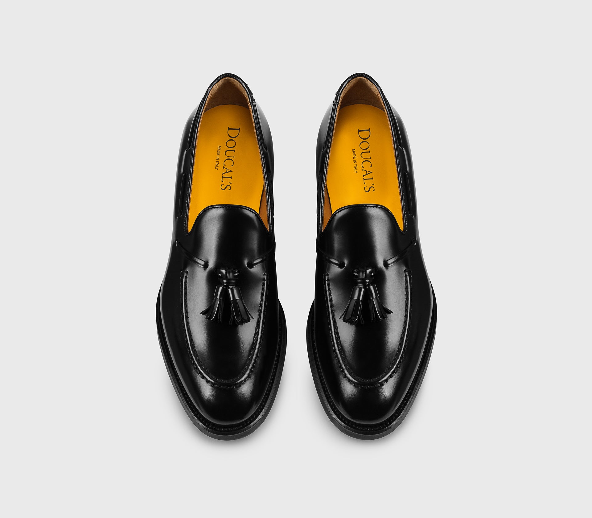 DU3339ORVNUF007NN00 - Mocassino con nappine in pelle nero