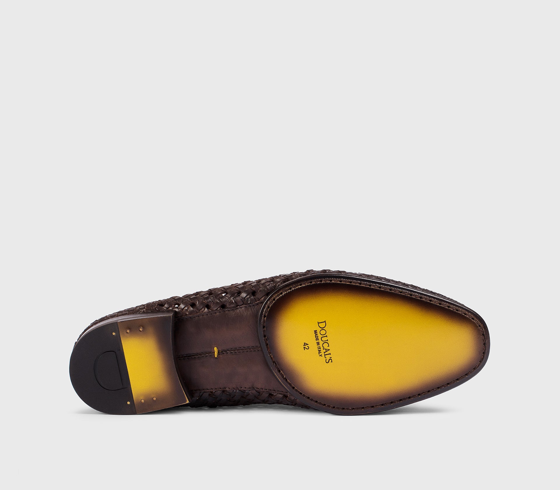 DU3522TAORUZ276TM00 - Mocassino in pelle traforata con nappine testa di moro